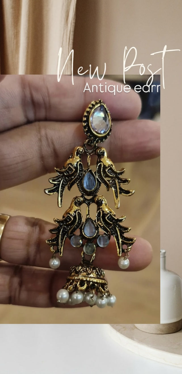 Double peacock earrings